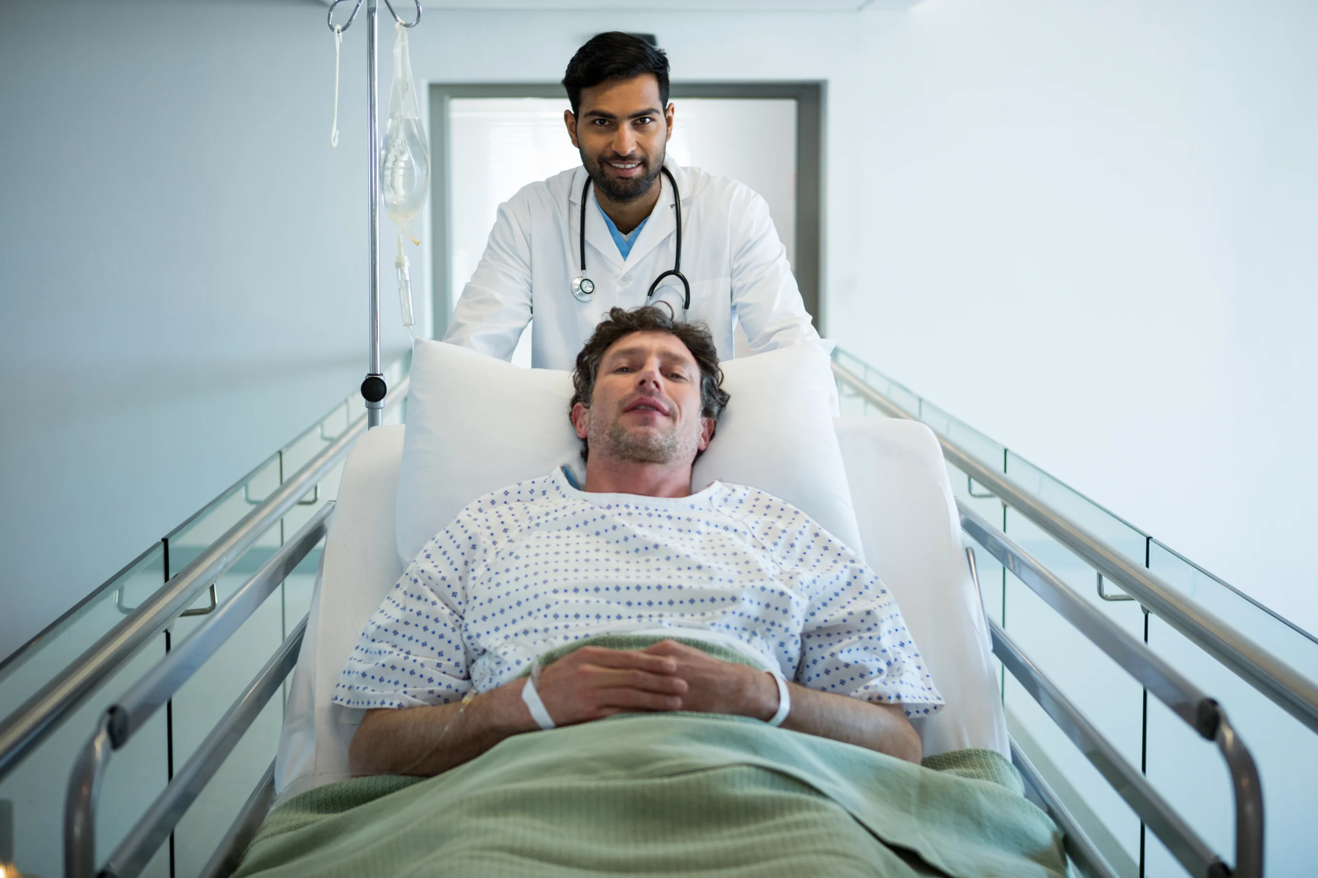 doctor-pushing-emergency-stretcher-bed-corridor