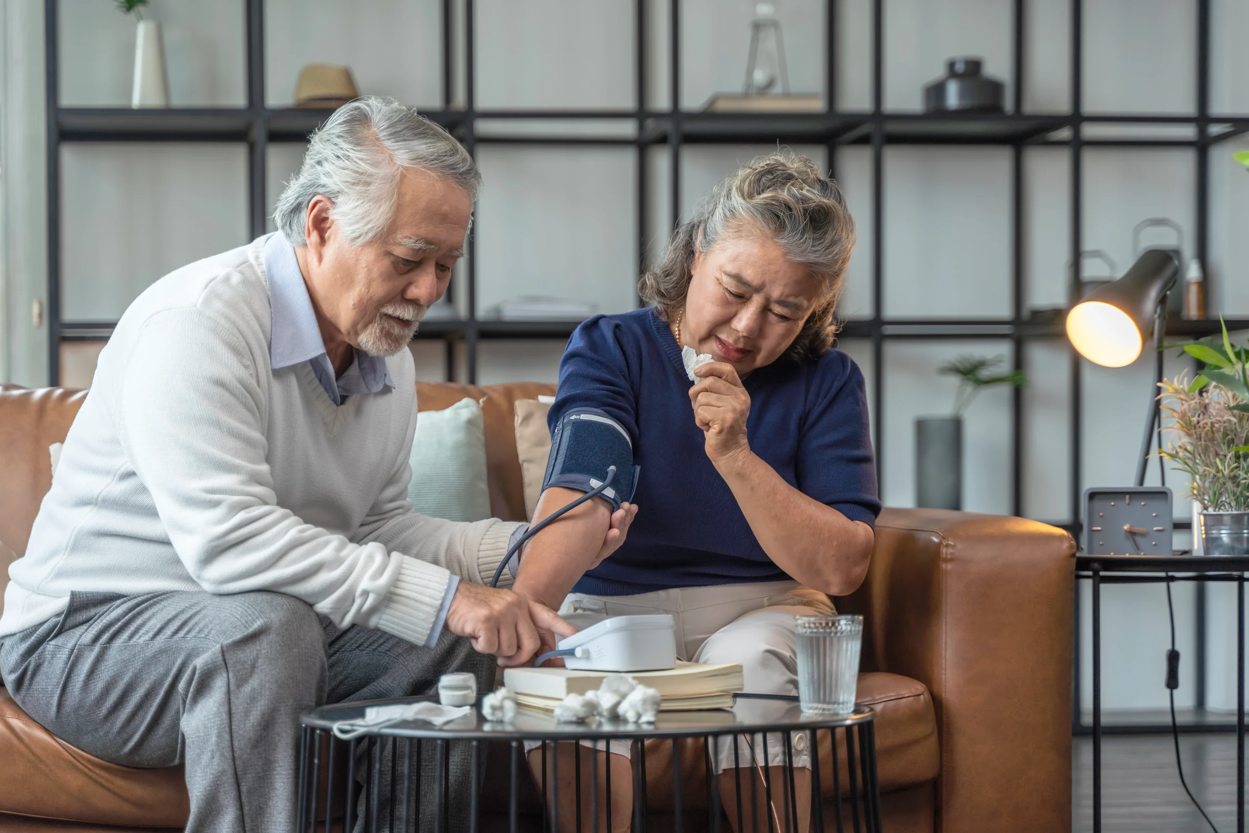 grandfather-hand-use-digital-measuring-blood-pressure-home-with-portable-device-checking-grandmotherasian-couple-checking-blood-pressure-home