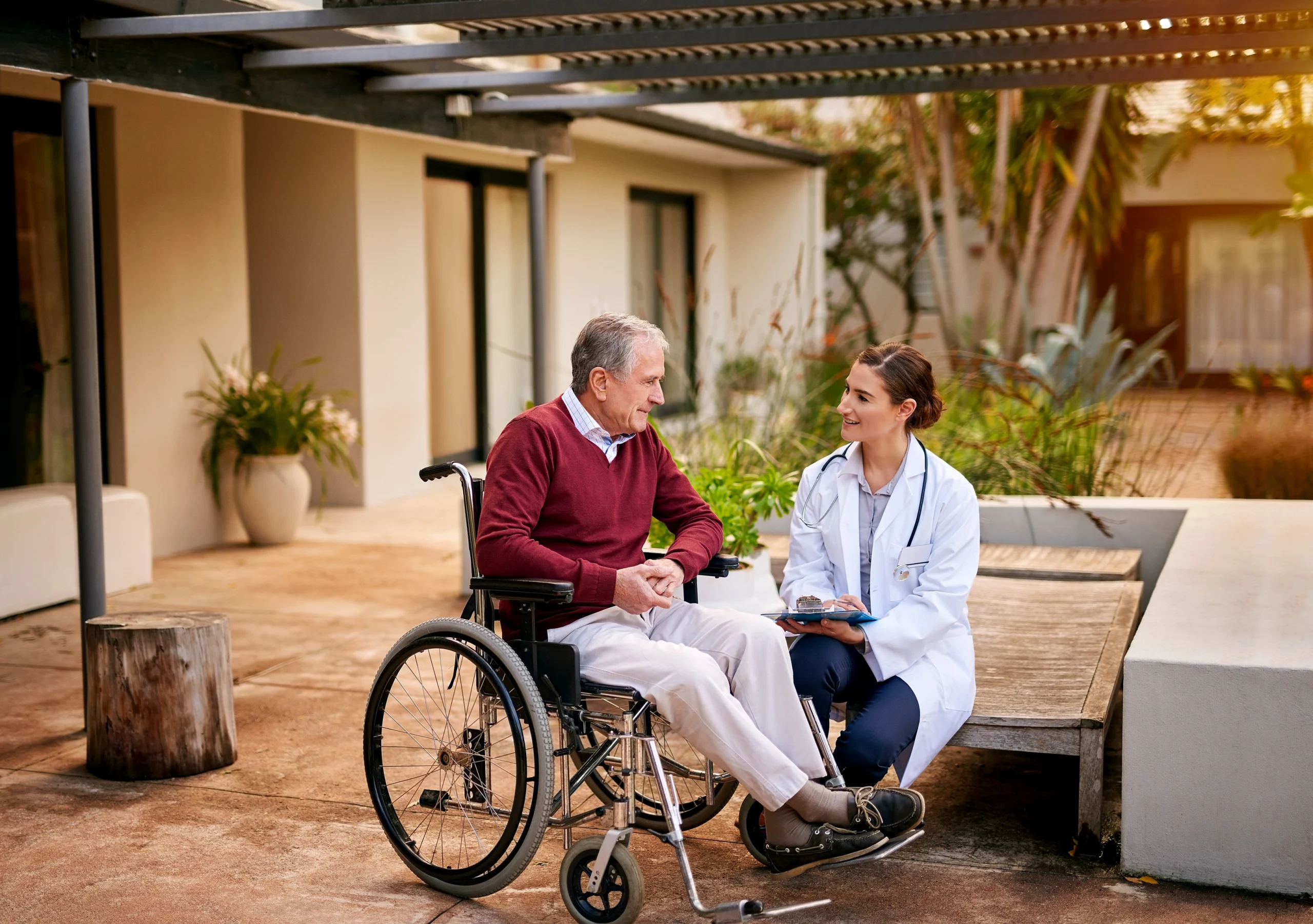 he-trusts-her-expertise-implicitly-shot-young-doctor-her-elderly-patient-talking-while-sitting-outside