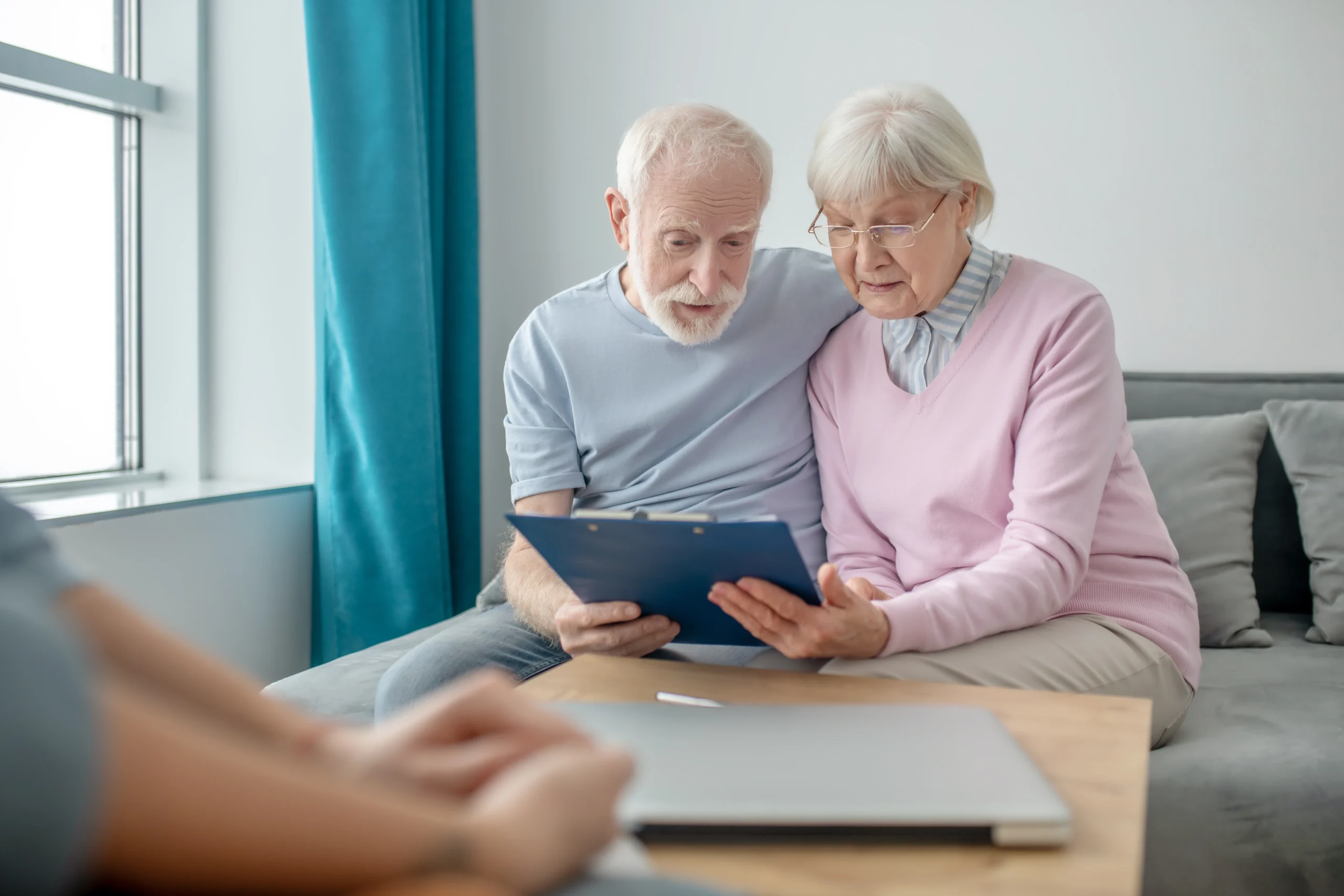health-insurance-senior-couple-talking-insurance-company-agent-looking-involved