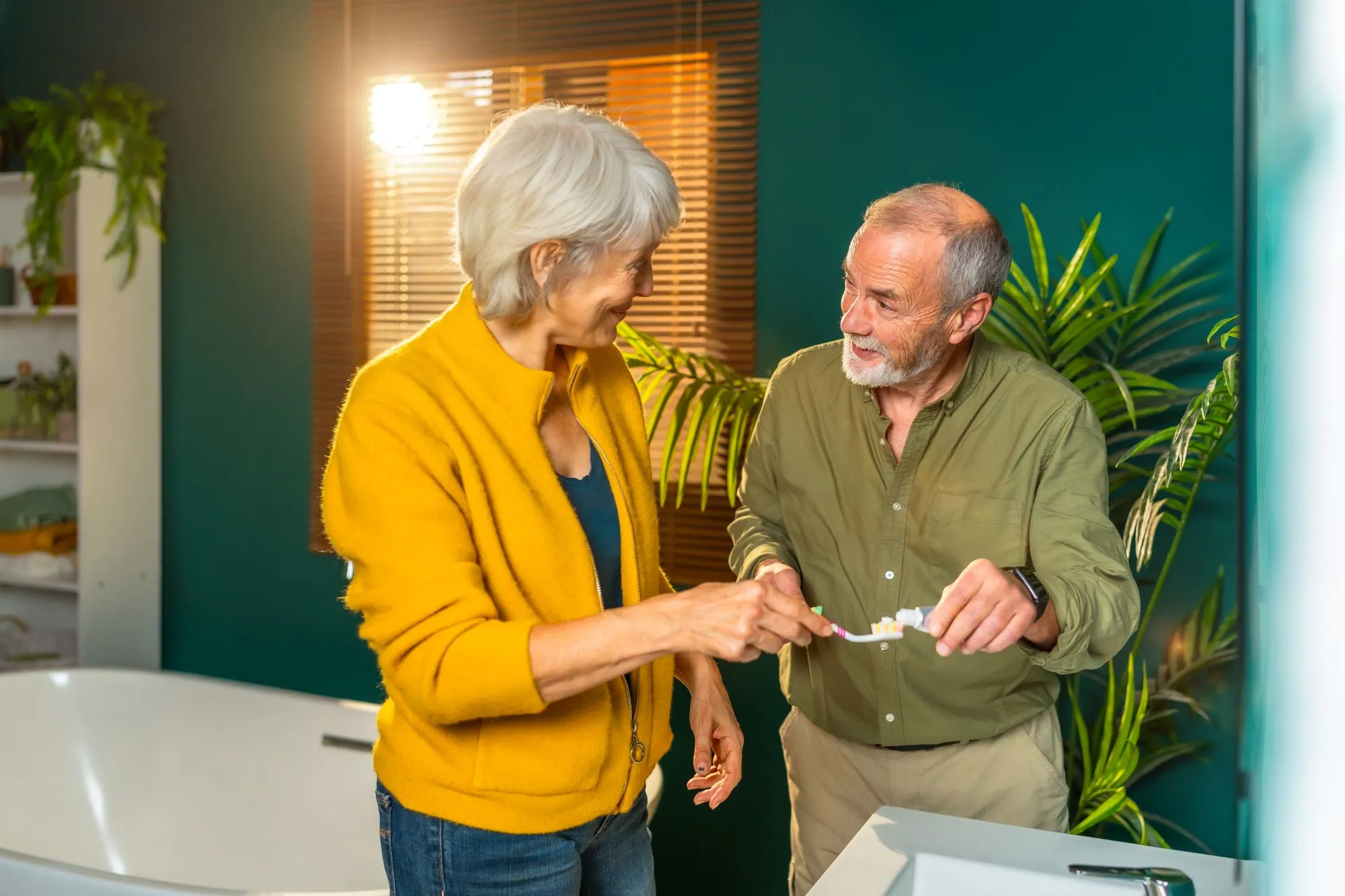 senior-couple-washing-teeth-together-home
